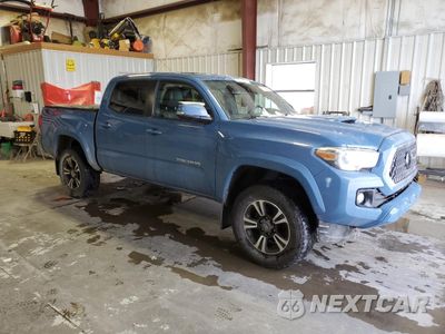 Czwarte zdjęcie samochodu z boku: 2019 TOYOTA TACOMA DOUBLE CAB VIN:3TMCZ5AN6KM189859 - miniatura