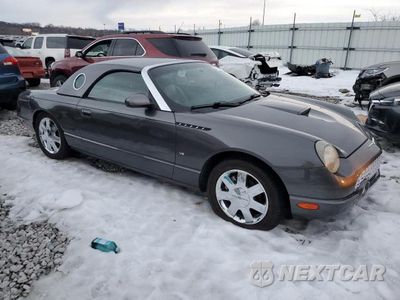 Czwarte zdjęcie samochodu z boku: 2003 FORD THUNDERBIRD VIN:1FAHP60A23Y109775 - miniatura