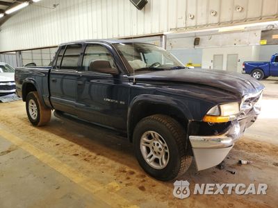 Czwarte zdjęcie samochodu z boku: 2002 DODGE DAKOTA QUAD SLT VIN:1B7HG48N02S616617 - miniatura