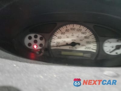 Zdjęcie 9 z 12 samochodu: 2003 TOYOTA ECHO VIN:JTDBT123530305432 - miniatura