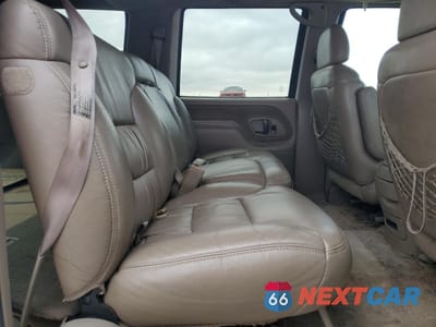 Zdjęcie 10 z 14 samochodu: 1999 CHEVROLET SUBURBAN VIN:3GNET16R9XG258538 - miniatura
