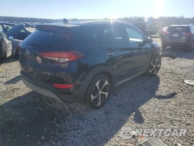 Trzecie zdjęcie samochodu z tyłu: 2018 HYUNDAI TUCSON VALUE VIN:KM8J33A23JU720105 - miniatura