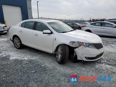 Czwarte zdjęcie samochodu z boku: 2014 LINCOLN MKS VIN:1LNHL9FT3EG600893 - miniatura