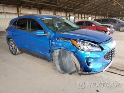 Czwarte zdjęcie samochodu z boku: 2020 FORD ESCAPE TITANIUM VIN:1FMCU9J93LUB19608 - miniatura