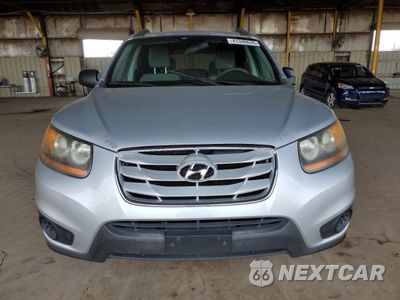 Piąte zdjęcie samochodu w środku: 2010 HYUNDAI SANTA FE GLS VIN:5NMSG3AB7AH345419 - miniatura