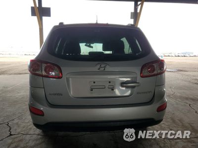 Zdjęcie 6 z 13 samochodu: 2010 HYUNDAI SANTA FE GLS VIN:5NMSG3AB7AH345419 - miniatura