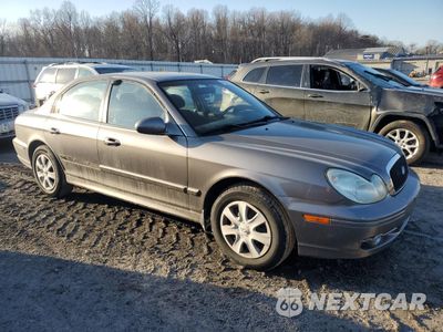 Czwarte zdjęcie samochodu z boku: 2004 HYUNDAI SONATA GL VIN:KMHWF25H24A927936 - miniatura