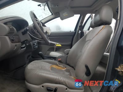 Zdjęcie 7 z 13 samochodu: 2004 CHRYSLER SEBRING LIMITED VIN:1C3AL66R64N378759 - miniatura