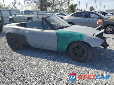 Czwarte zdjęcie samochodu z boku: 1995 MAZDA MX-5 MIATA VIN:JM1NA3539T0718335 - miniatura