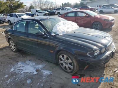 Czwarte zdjęcie samochodu z boku: 2004 JAGUAR X-TYPE 3.0 VIN:SAJEA51C44WE16696 - miniatura