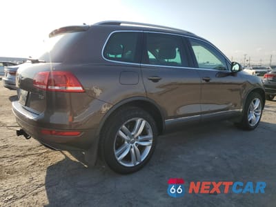 Trzecie zdjęcie samochodu z tyłu: 2012 VOLKSWAGEN TOUAREG V6 TDI VIN:WVGEK9BP0CD007182 - miniatura