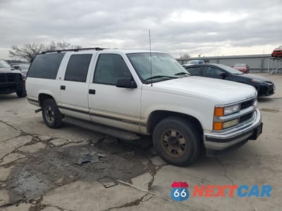 Czwarte zdjęcie samochodu z boku: 1999 CHEVROLET SUBURBAN VIN:3GNET16R9XG258538 - miniatura