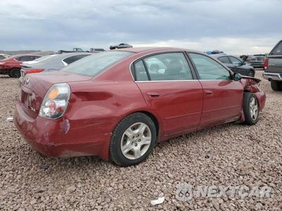 Trzecie zdjęcie samochodu z tyłu: 2004 NISSAN ALTIMA BASE VIN:1N4AL11D14C128826 - miniatura
