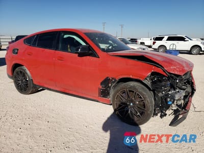 Czwarte zdjęcie samochodu z boku: 2021 BMW X6 M VIN:5YMCY0C08M9D77978 - miniatura