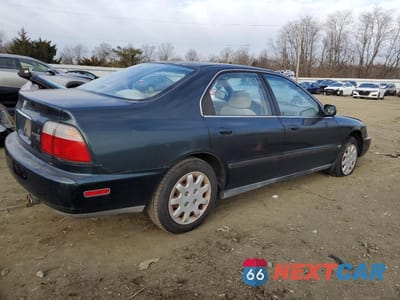 Trzecie zdjęcie samochodu z tyłu: 1997 HONDA ACCORD LX VIN:1HGCE6643VA022945 - miniatura