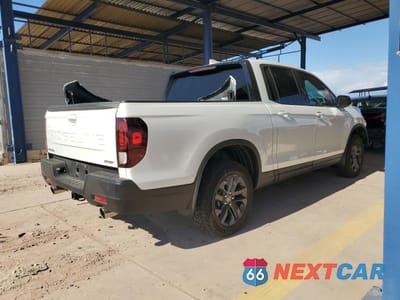 Trzecie zdjęcie samochodu z tyłu: 2024 HONDA RIDGELINE SPORT VIN:5FPYK3F11RB014302 - miniatura