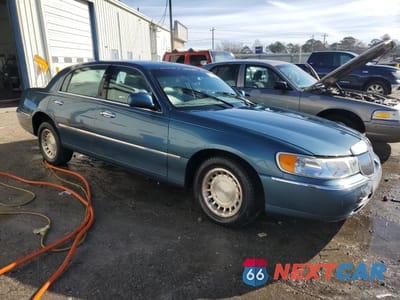 Zdjęcie 7 z 22 samochodu: 2001 LINCOLN TOWN CAR EXECUTIVE VIN:1LNHM81W01Y648008 - miniatura