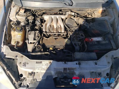 Zdjęcie 12 z 14 samochodu: 2000 FORD TAURUS SE VIN:1FAFP5327YG202472 - miniatura