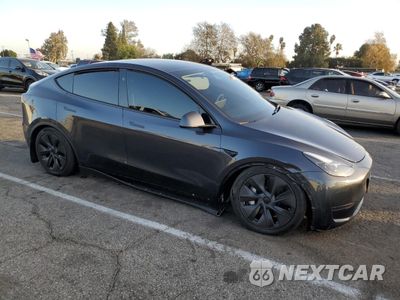 Czwarte zdjęcie samochodu z boku: 2024 TESLA MODEL Y VIN:7SAYGDED0RF111859 - miniatura