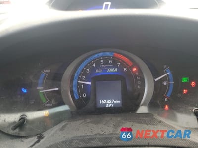 Zdjęcie 9 z 13 samochodu: 2010 HONDA INSIGHT EX VIN:JHMZE2H75AS036373 - miniatura