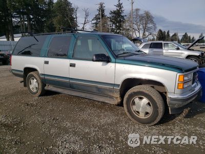 Czwarte zdjęcie samochodu z boku: 1997 GMC SUBURBAN K1500 VIN:1GKFK16RXVJ719908 - miniatura
