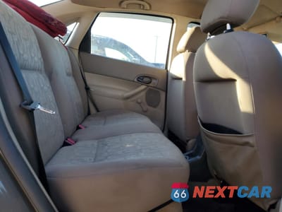 Zdjęcie 10 z 12 samochodu: 2005 FORD FOCUS ZX4 VIN:1FAFP34N25W170674 - miniatura