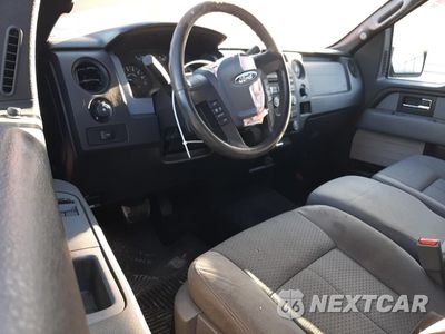 Zdjęcie 8 z 12 samochodu: 2014 FORD F150 VIN:1FTMF1CM5EFC41402 - miniatura