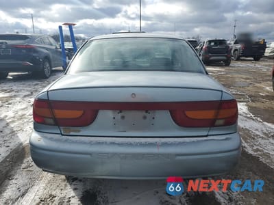 Zdjęcie 6 z 13 samochodu: 2002 SATURN SL2 VIN:1G8ZK52742Z309388 - miniatura