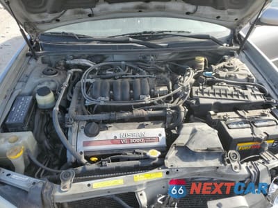 Zdjęcie 12 z 14 samochodu: 2001 NISSAN MAXIMA GXE VIN:JN1CA31D61T613823 - miniatura