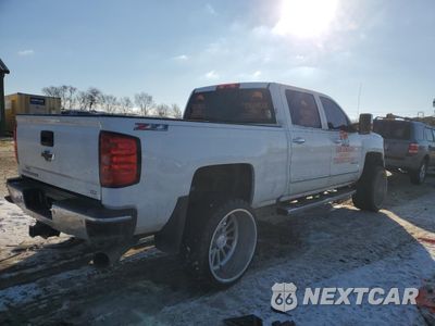 Trzecie zdjęcie samochodu z tyłu: 2015 CHEVROLET SILVERADO K2500 HEAVY DUTY LTZ VIN:1GC1KWE88FF670451 - miniatura