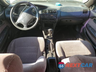 Zdjęcie 8 z 12 samochodu: 1995 TOYOTA COROLLA LE VIN:1NXAE09B2SZ329302 - miniatura