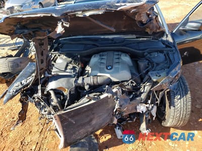 Zdjęcie 13 z 15 samochodu: 2005 BMW 745 LI VIN:WBAGN63595DS59870 - miniatura