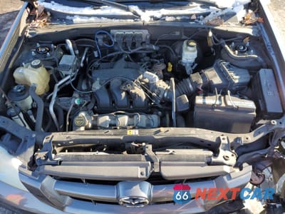 Zdjęcie 12 z 14 samochodu: 2005 MAZDA TRIBUTE S VIN:4F2YZ941X5KM52100 - miniatura
