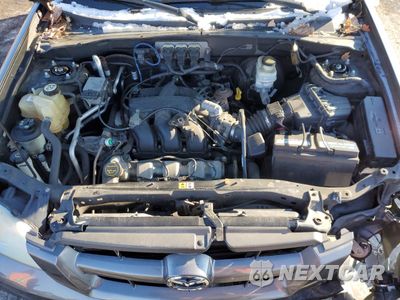 Zdjęcie 12 z 14 samochodu: 2005 MAZDA TRIBUTE S VIN:4F2YZ941X5KM52100 - miniatura