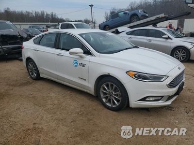 Czwarte zdjęcie samochodu z boku: 2017 FORD FUSION SE HYBRID VIN:3FA6P0LU3HR409681 - miniatura