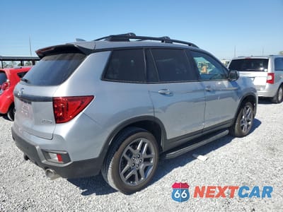 Trzecie zdjęcie samochodu z tyłu: 2023 HONDA PASSPORT EXL VIN:5FNYF8H54PB040111 - miniatura