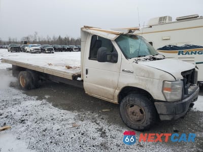 Czwarte zdjęcie samochodu z boku: 2019 FORD ECONOLINE E450 SUPER DUTY CUTAWAY VAN VIN:1FDXE4FS5KDC01125 - miniatura