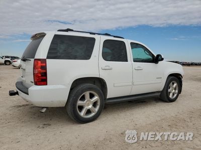 Trzecie zdjęcie samochodu z tyłu: 2012 CHEVROLET TAHOE C1500 LT VIN:1GNSCBE00CR284645 - miniatura