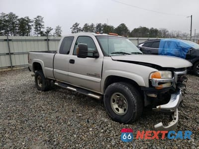 Czwarte zdjęcie samochodu z boku: 2004 GMC SIERRA VIN:1GTHK29124E193622 - miniatura