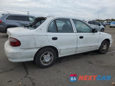 Trzecie zdjęcie samochodu z tyłu: 1999 HYUNDAI ACCENT GL VIN:KMHVF24N6XU566295 - miniatura