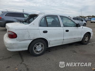 Trzecie zdjęcie samochodu z tyłu: 1999 HYUNDAI ACCENT GL VIN:KMHVF24N6XU566295 - miniatura