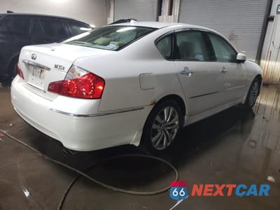 Trzecie zdjęcie samochodu z tyłu: 2009 INFINITI M35 BASE VIN:JNKCY01FX9M850747 - miniatura