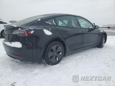 Trzecie zdjęcie samochodu z tyłu: 2023 TESLA MODEL 3 VIN:5YJ3E1EA6PF437633 - miniatura