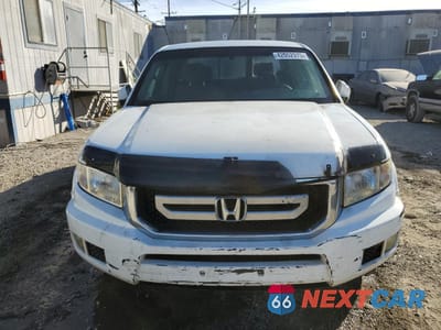 Piąte zdjęcie samochodu w środku: 2009 HONDA RIDGELINE RTS VIN:5FPYK16429B108803 - miniatura