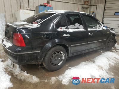 Trzecie zdjęcie samochodu z tyłu: 1999 VOLKSWAGEN JETTA GLS TDI VIN:3VWSF29M5XM033878 - miniatura