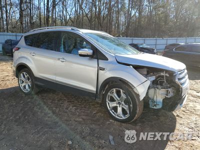 Czwarte zdjęcie samochodu z boku: 2018 FORD ESCAPE TITANIUM VIN:1FMCU0J97JUD00042 - miniatura