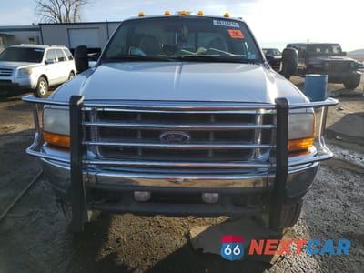 Piąte zdjęcie samochodu w środku: 2001 FORD F350 SRW SUPER DUTY VIN:1FTSW31F31EA57700 - miniatura