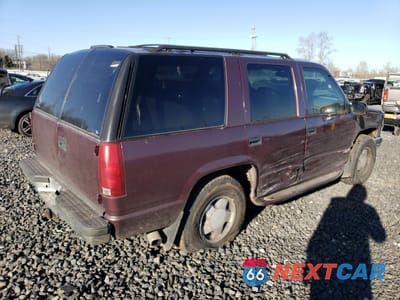 Trzecie zdjęcie samochodu z tyłu: 1996 CHEVROLET TAHOE K1500 VIN:1GNEK13R4TJ338006 - miniatura
