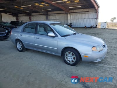 Czwarte zdjęcie samochodu z boku: 2004 KIA SPECTRA GS VIN:KNAFB161045142851 - miniatura