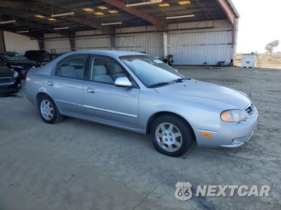 Czwarte zdjęcie samochodu z boku: 2004 KIA SPECTRA GS VIN:KNAFB161045142851 - miniatura